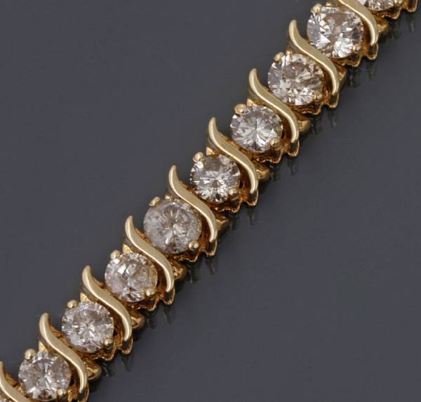 Appraisal: A diamond and k gold tennis bracelet one diamond deficient