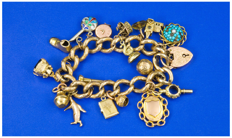 Appraisal: Carat Gold Charm Bracelet Loaded with charms Total weight grammes