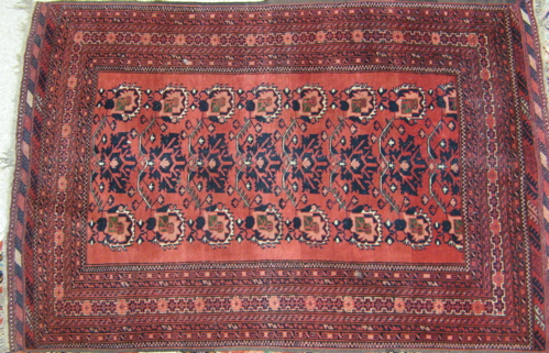 Appraisal: TWO PERSIAN BELOUCHI TRIBAL AREA RUGS both with stylized floral