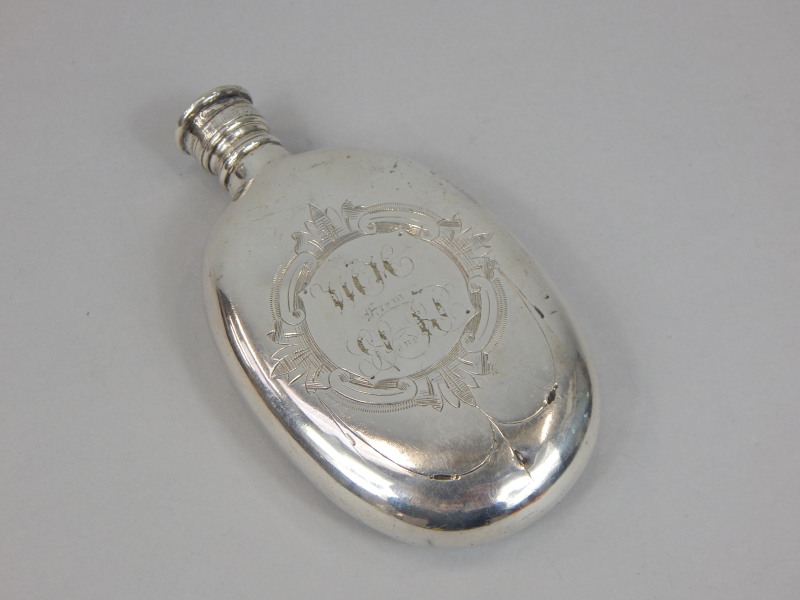 Appraisal: An early thC silver plated oval hip flask with engraved