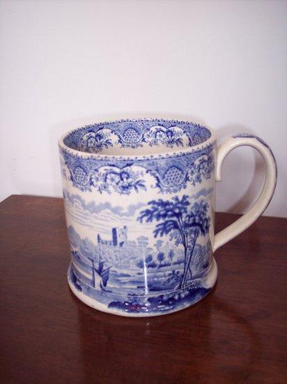 Appraisal: A th Century blue and white mug attributed to John