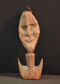 Appraisal: Middle Sepik Double Faced Food Hook carved wood and embedded