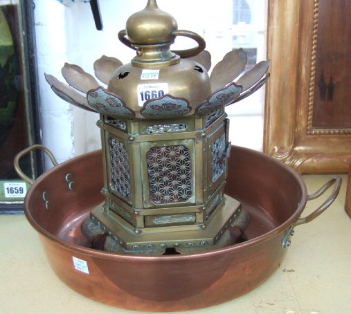 Appraisal: A Burmese brass hanging lantern of hexagonal shape and a