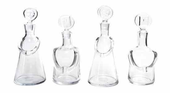 Appraisal: A Collection of Four Figural Glass Decanters each of typical