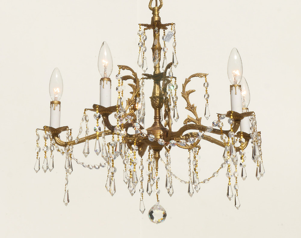 Appraisal: SPANISH BRASS CRYSTAL LIGHT CHANDELIER Gilt brass arms with crystal