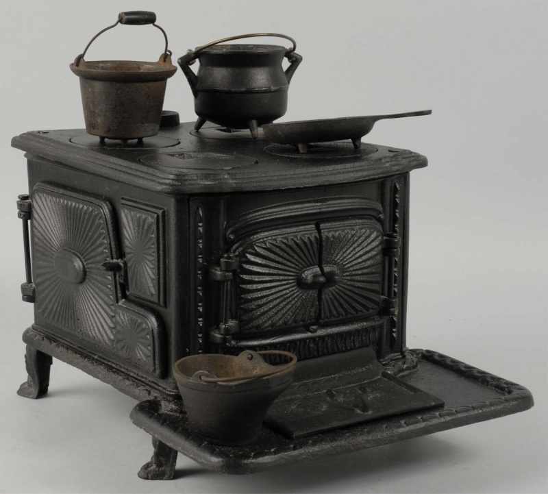 Appraisal: Cast Iron NS Cate May Children's Stove Description Includes accessories