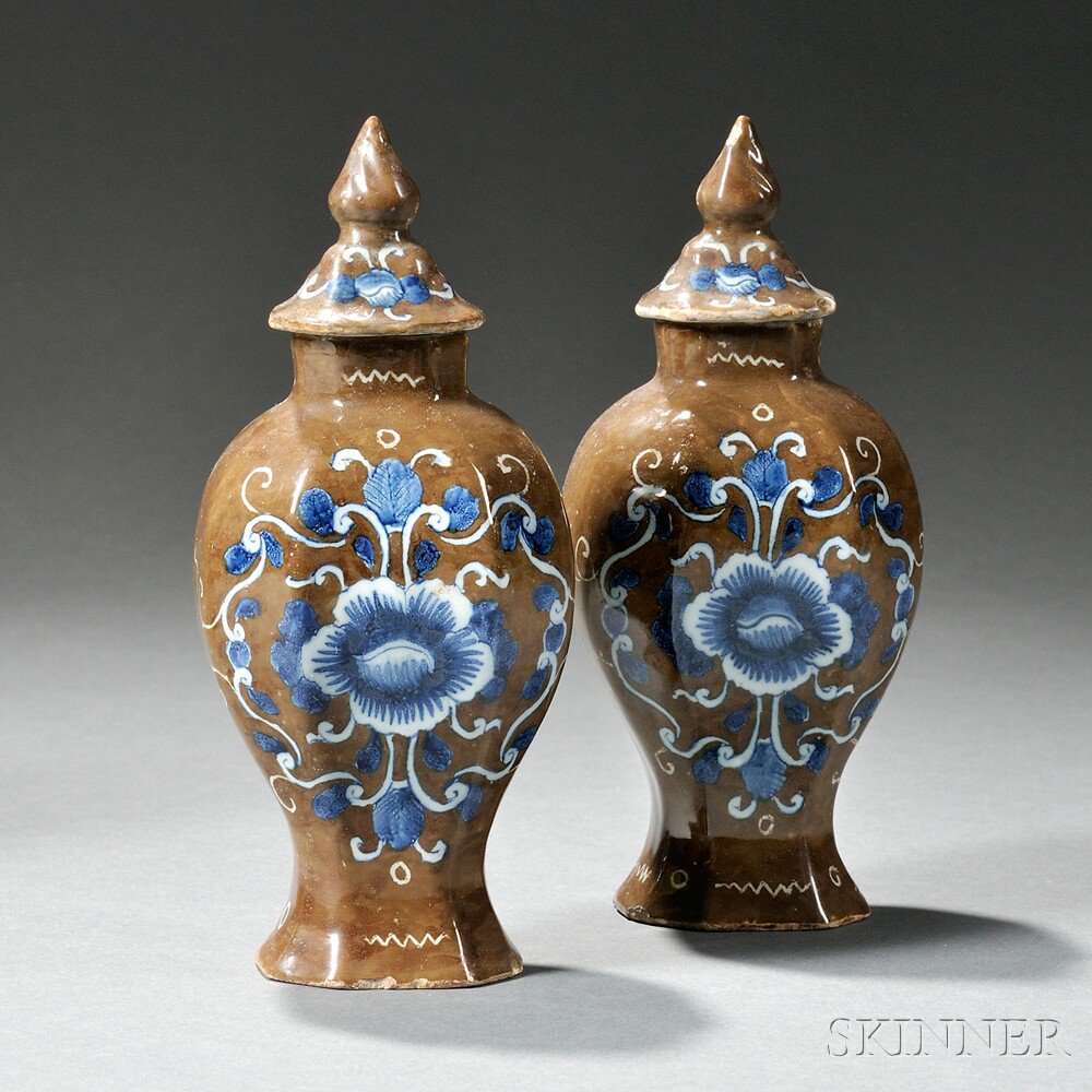 Appraisal: Pair of Miniature Dutch Delft Batavian Brown Vases and Covers