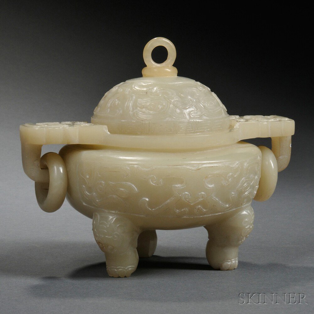 Appraisal: Stone Covered Tripod Censer China with archaic decoration the top