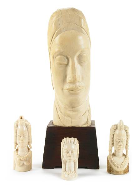 Appraisal: A group of four African ivory carvings for the tourist