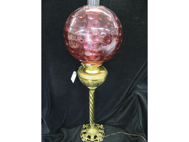 Appraisal: Victorian Banquet Lamp with Cranberry Art Glass Shade coin spot