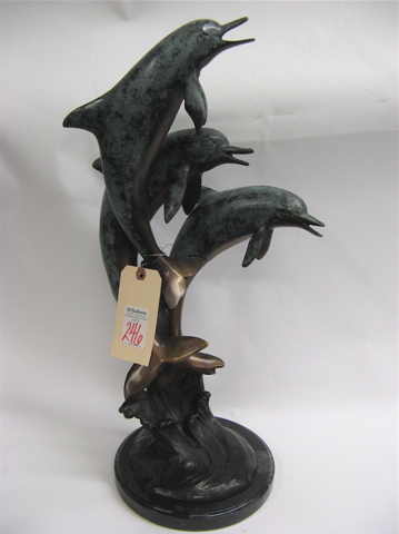 Appraisal: CONTEMPORARY BRONZE SCULPTURE depicting three playful dolphins leaping out of