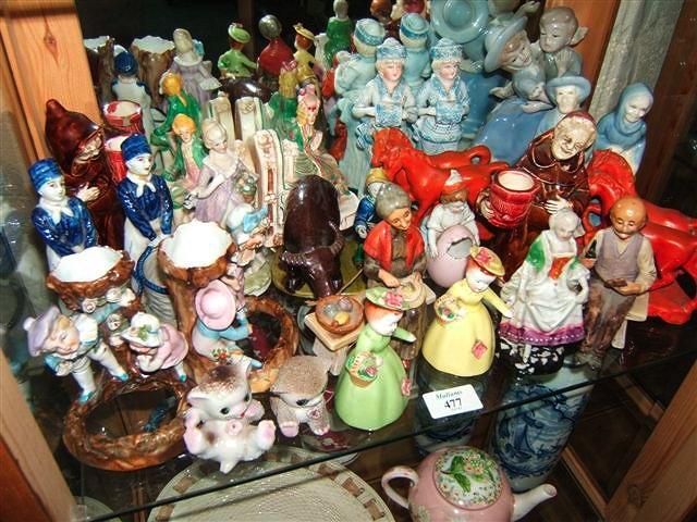 Appraisal: A quantity of pottery and porcelain figures horses Dutch children