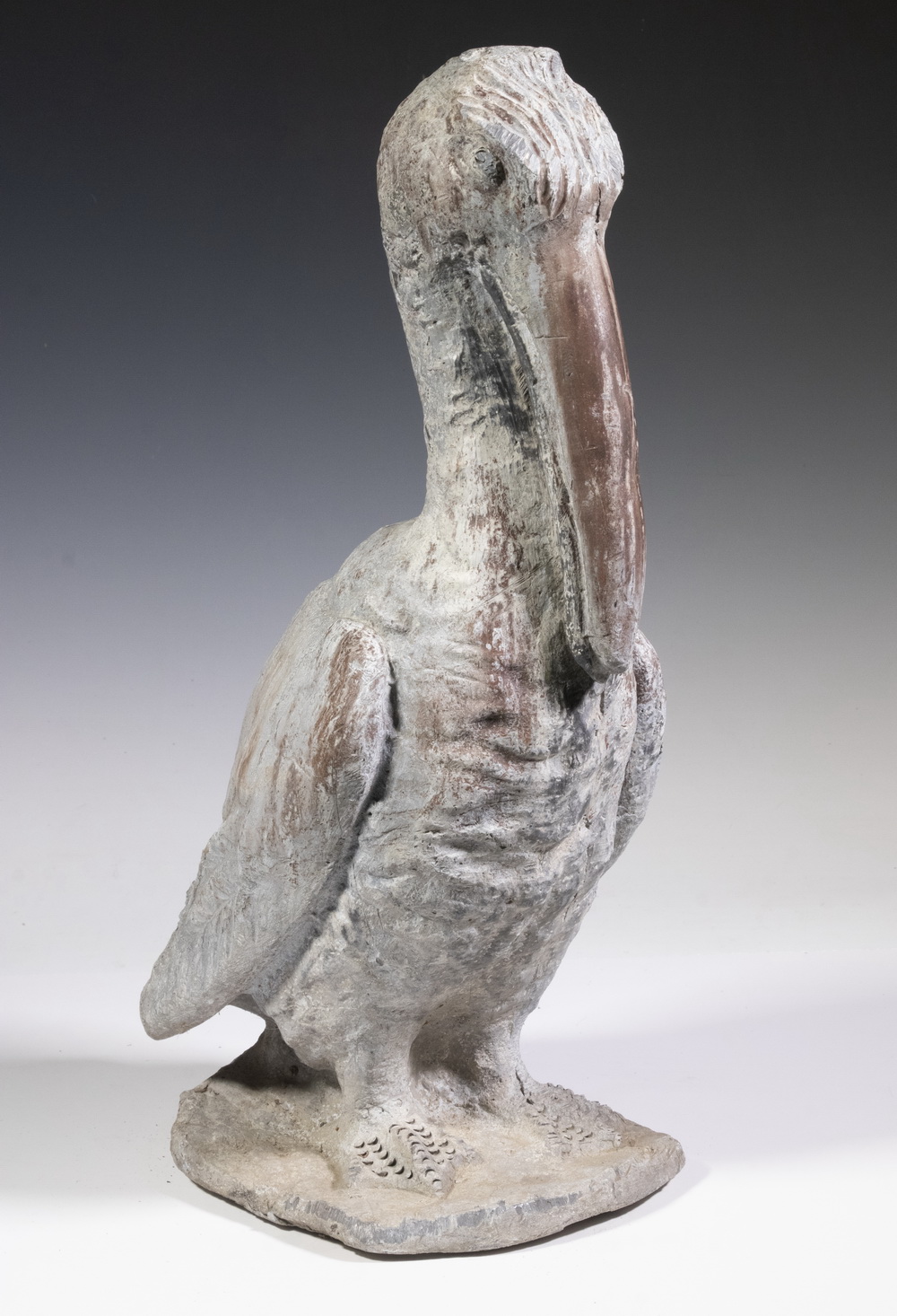 Appraisal: ZINC PELICAN GARDEN STATUE CIRCA Full-round Figure cement filled depicted