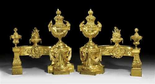 Appraisal: PAIR OF GILT BRONZE FIREPLACE CHENETS Louis XVI attributed to