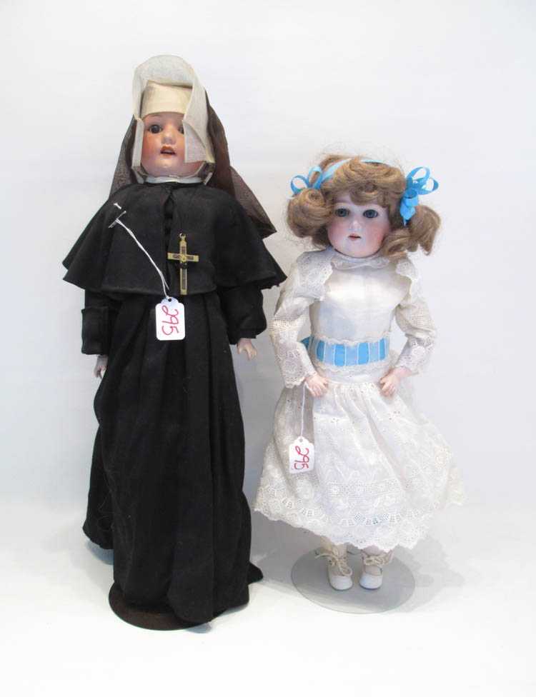 Appraisal: TWO GERMAN BISQUE HEAD DOLLS including a Heubach nun doll