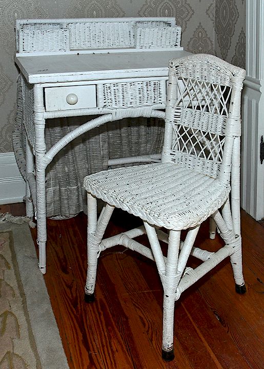 Appraisal: Wicker Writing Desk and Chair An early th century wicker