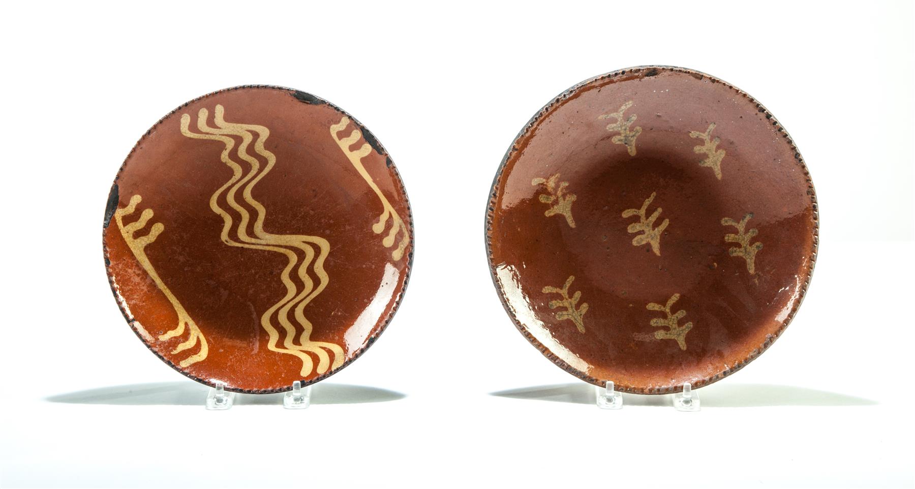 Appraisal: TWO AMERICAN REDWARE PIE PLATES Mid th century Coggled rims