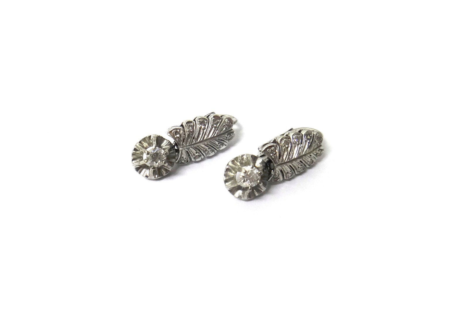 Appraisal: A pair of diamond set earrings each claw set with