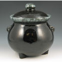 Appraisal: Black cauldron pot with lid on three feet Marked USA