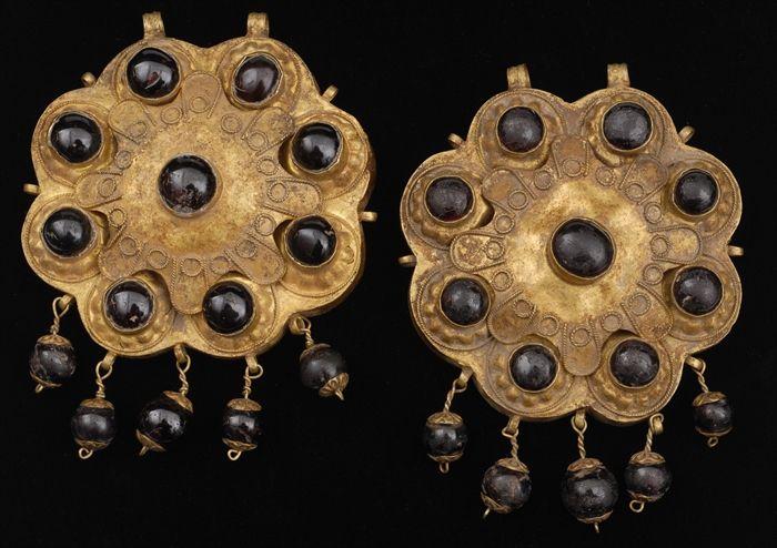 Appraisal: TWO EARLY PERSIAN-STYLE ROSETTE-FORM PENDANTS Provenance Property from the Collection