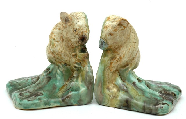 Appraisal: REMUED Victoria circa A matched pair of earthenware bookends each