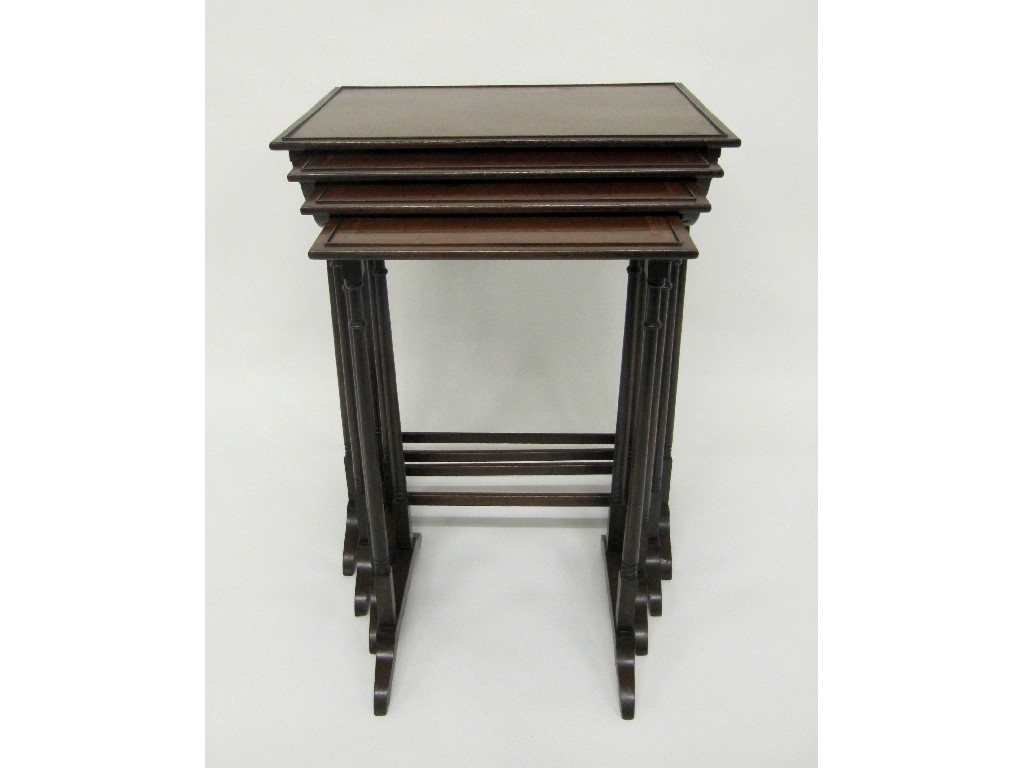 Appraisal: An Edwardian mahogany inlaid nest of four 'Quarteto' tables inlaid