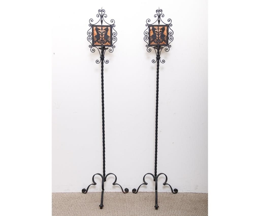 Appraisal: Pair of wrought iron torchieres probably 's with cut out