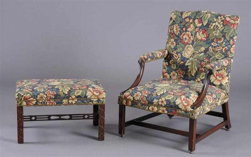 Appraisal: GEORGE III STYLE MAHOGANY LIBRARY ARMCHAIR AND A STOOL WITH