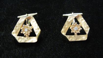 Appraisal: karat yellow gold and diamond cufflinksModified triangular shaped cufflink each