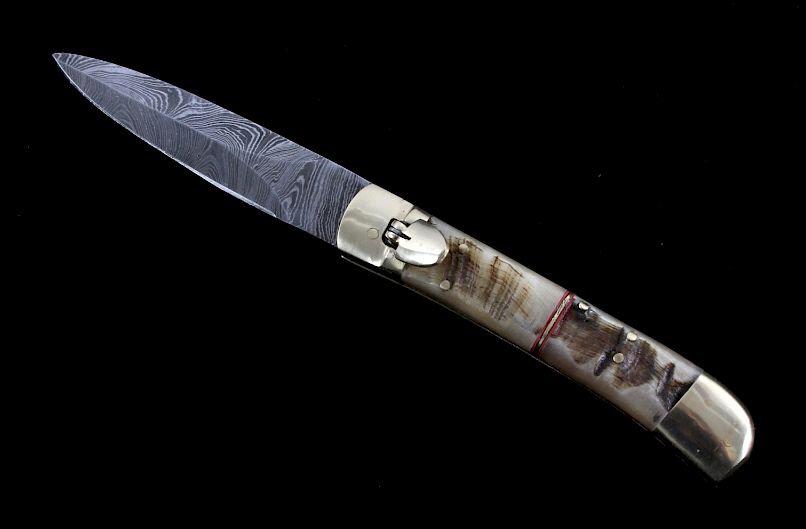 Appraisal: German Damascus Lever Lock Switchblade Knife This is a German