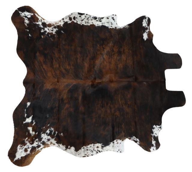 Appraisal: Cowhide black and brown brindle with some black and brown