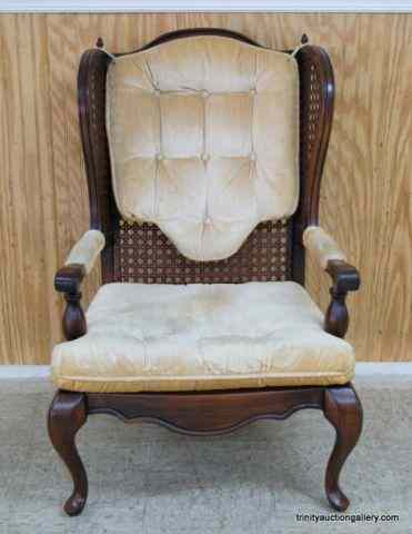 Appraisal: Vintage Mahogany Caned Wing Back Cushioned ChairFrom the estate is