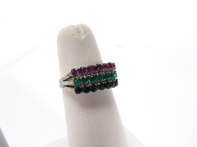 Appraisal: White gold lady's ring unmarked with three rows of semi-precious