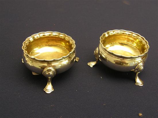 Appraisal: Pair of George III silver round salts with gilt interiors