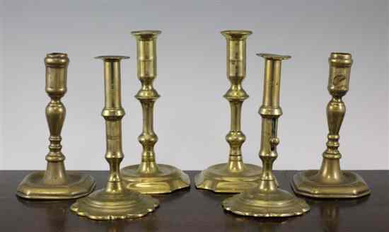 Appraisal: A pair of th century Joseph Wood brass candlesticks on