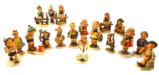 Appraisal: Hummel figurines four with full bee mark and fourteen with