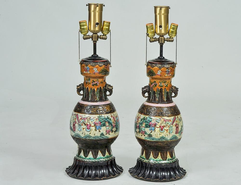 Appraisal: PAIR OF CARVED CRACKLE-WARE PORCELAIN VASES Chinese Each decorated with