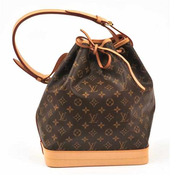 Appraisal: A NOE HANDBAG BY LOUIS VUITTON Styled in monogram canvas