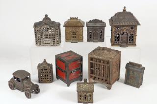 Appraisal: ARCHITECTURAL IRON COIN BANKS AUTOMOBILE TOY Collection of Antique Cast