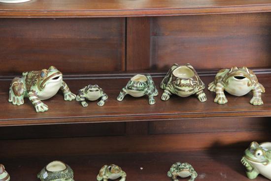 Appraisal: FIVE BRUSH POTTERY GARDEN FROGS TWO ARE PLANTERS Two brush