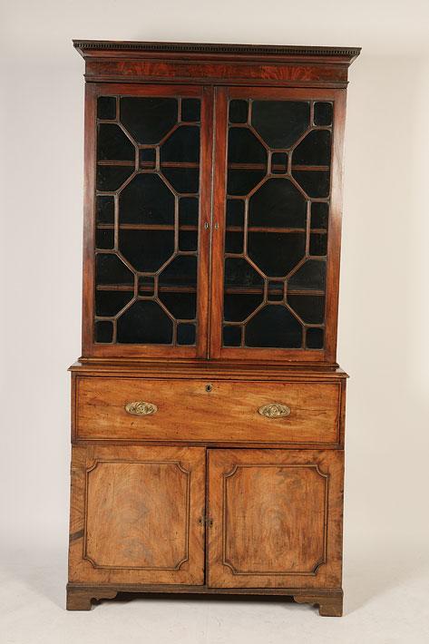 Appraisal: A GEORGE III MAHOGANY SECRETAIRE BOOKCASE the upper section with