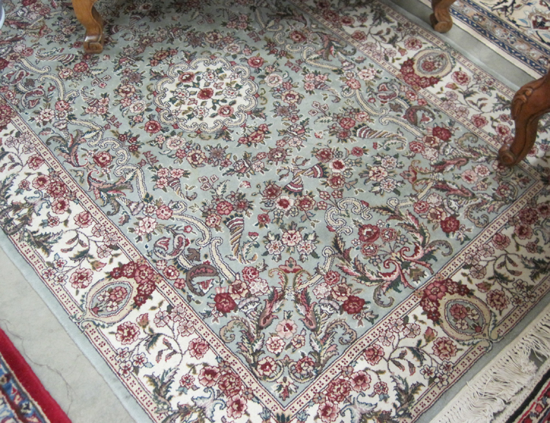 Appraisal: HAND KNOTTED ORIENTAL AREA RUG Indo-Persian floral and central floral