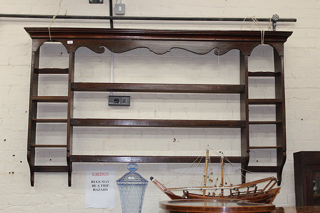 Appraisal: A TH CENTURY OAK PLATE RACK the central section of