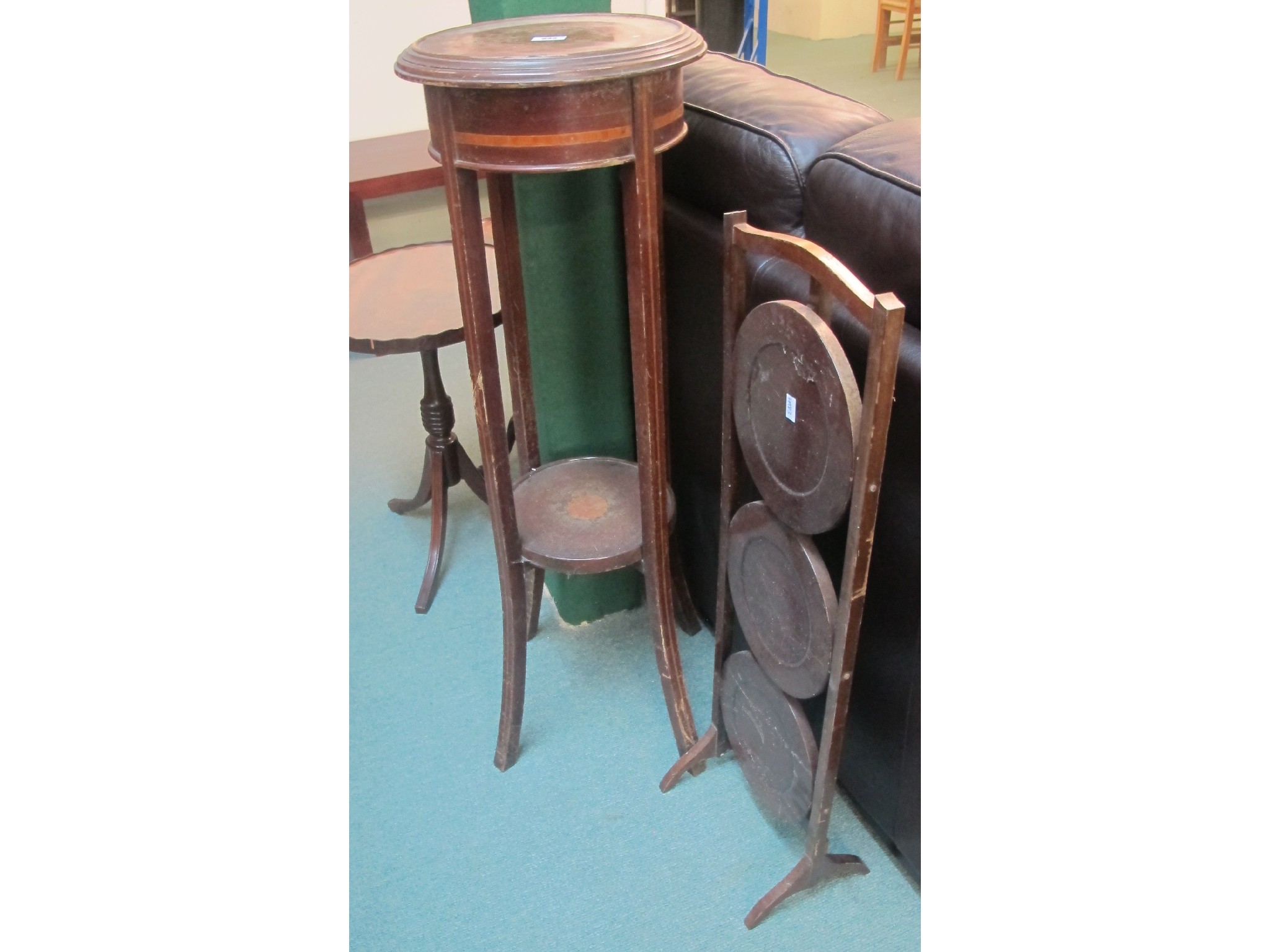 Appraisal: A mahogany plant stand and a cake stand