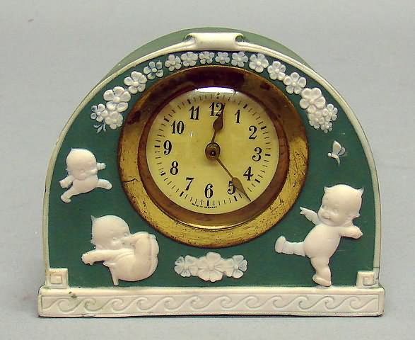 Appraisal: Green Jasperware Kewpie clock Brass clock is marked Made in