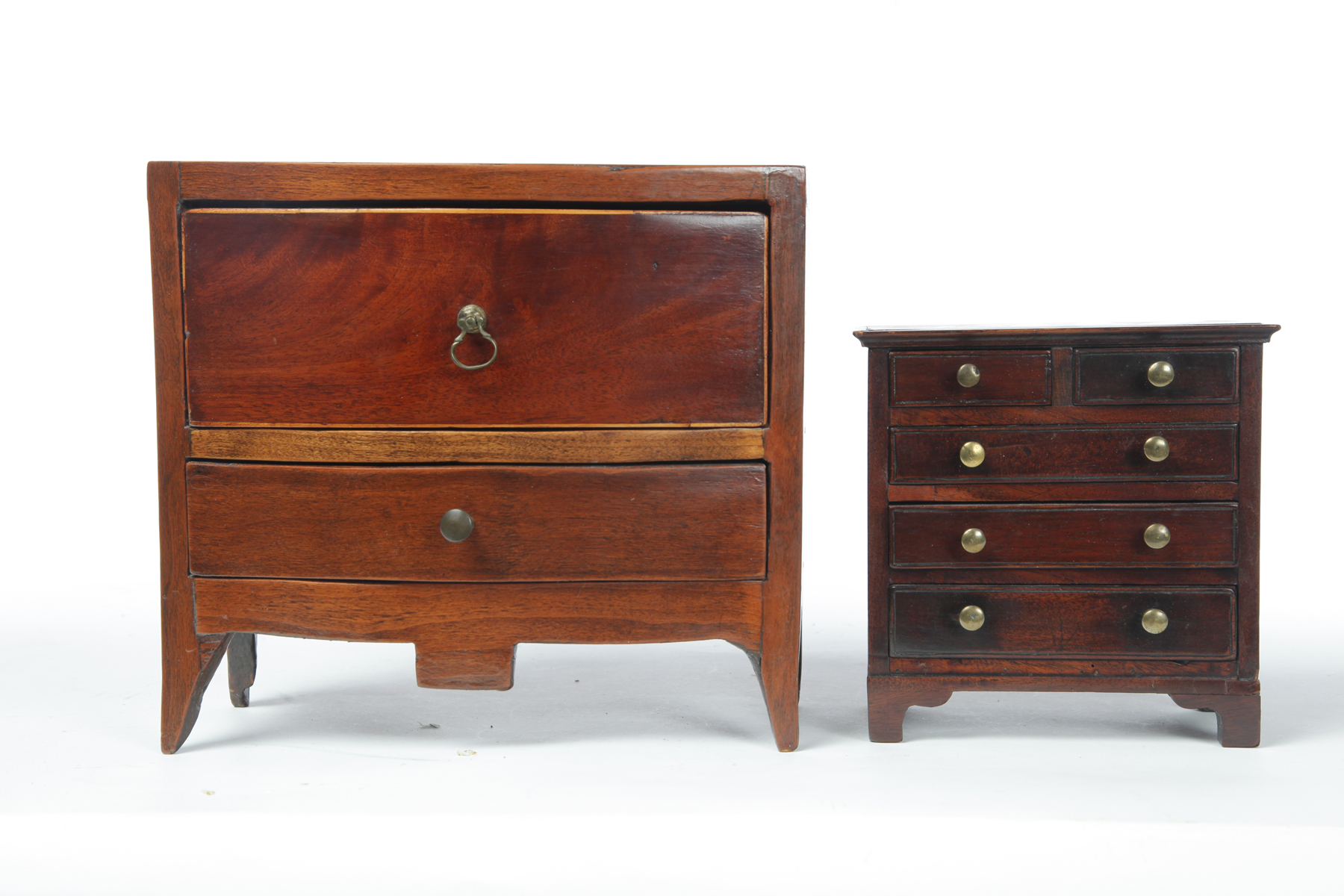 Appraisal: TWO MINIATURE CHESTS OF DRAWERS American and English th century