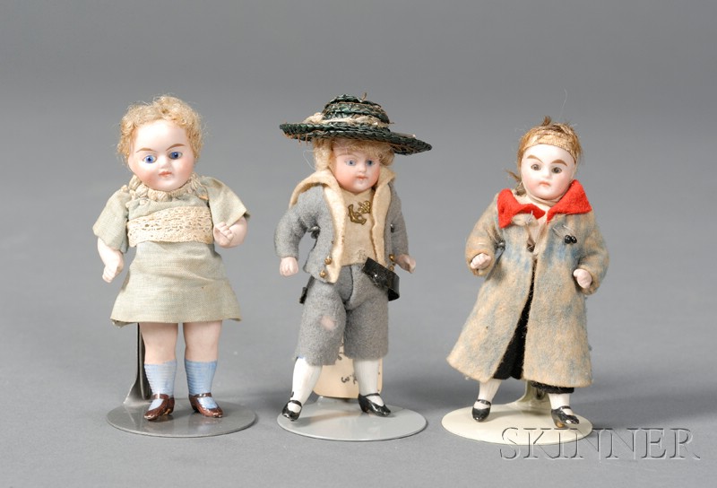 Appraisal: Three Glass-Eyed All-Bisque Dolls with rigid necks jointed limbs and