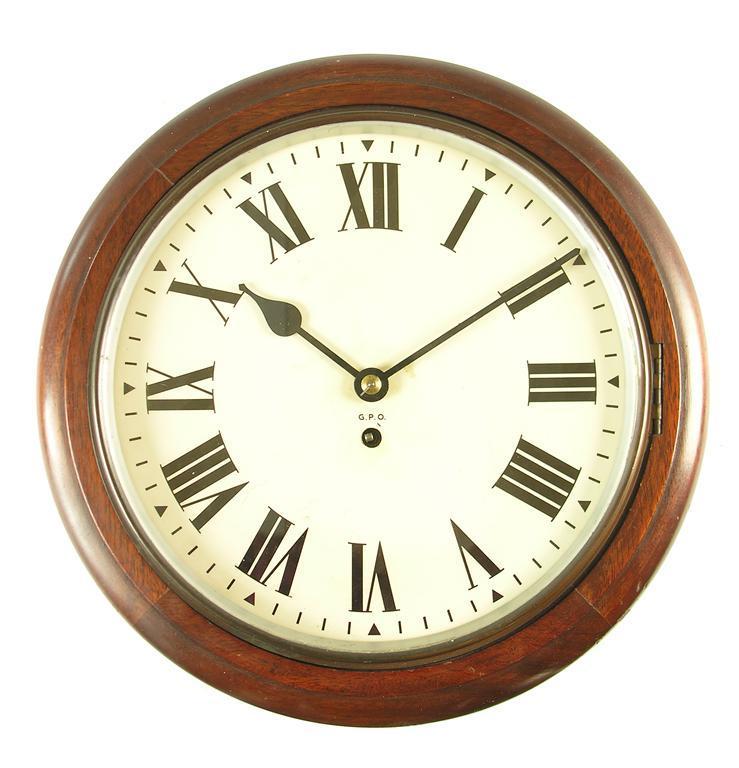 Appraisal: A mahogany wall timepiece