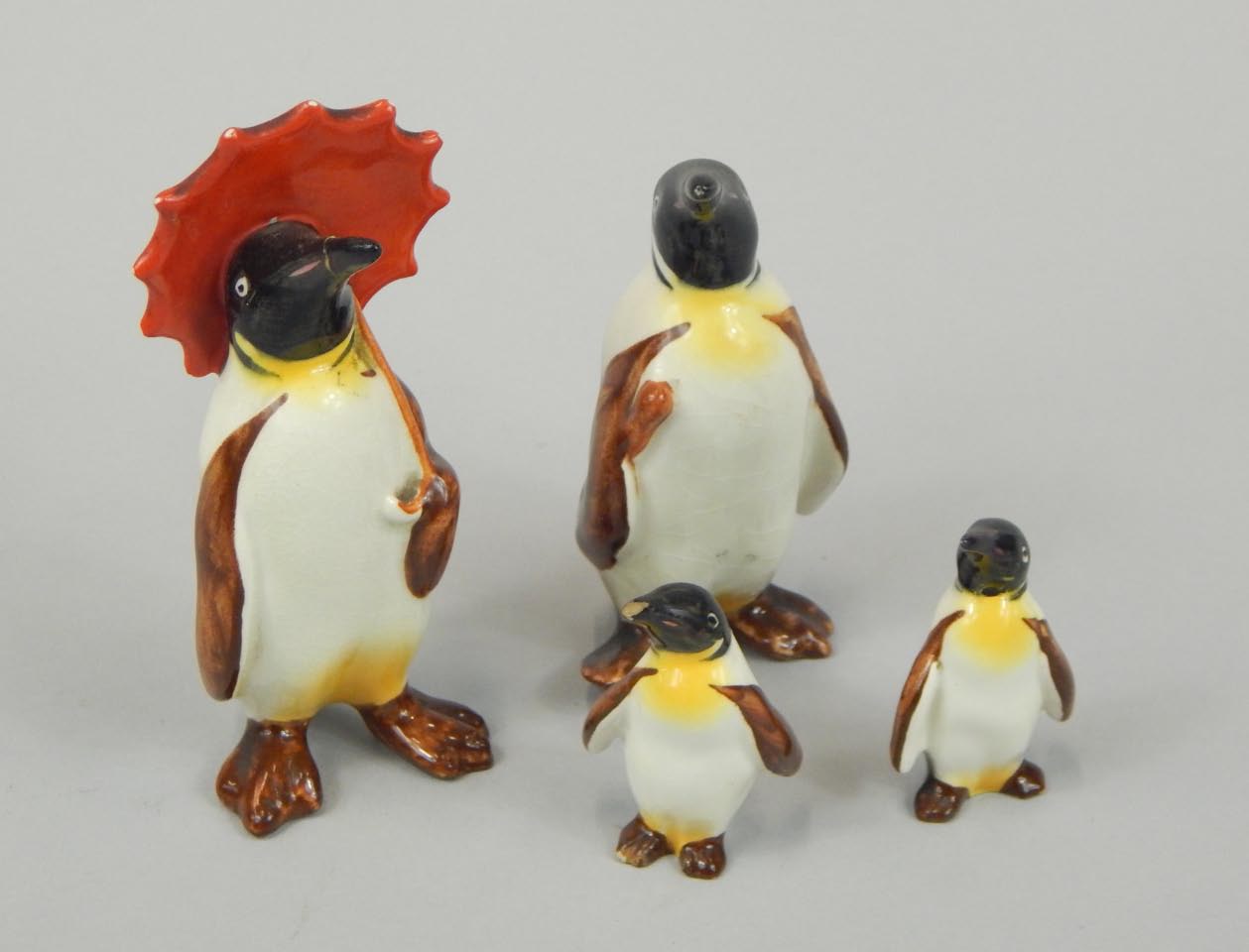 Appraisal: A Beswick figure of a penguin holding and umbrella cm