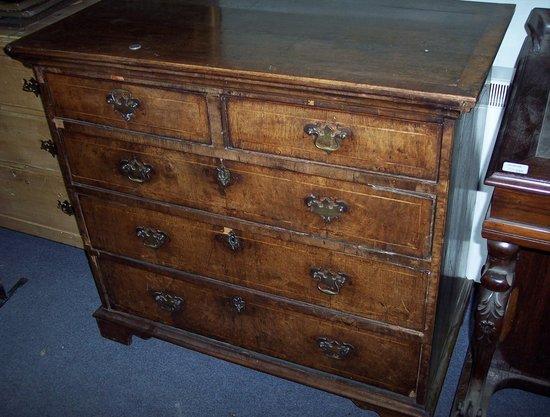 Appraisal: An early th Century walnut chest fitted three long and